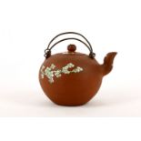 A Chinese enamelled Yixingi teapot with cover, Qing dynasty, 19th Century, the globular body