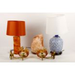 A pair of wall lights, mid-20th Century, with moulded amber glass shades; together with an amber