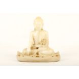 A carved Burmese white marble Buddha, sitting on a base in Bhumisparsha mudra wearing flowing robes,