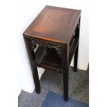 A Chinese hardwood jardinere stand, 19th Century, with rectangular top and undertier, on square
