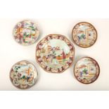 A set of five Chinese famille rose dishes, the small round dishes painted with scenes of a lady