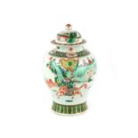 A Chinese famille verte 'warriors' jar and cover, of baluster form, the wide rimed domed cover