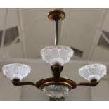 An French Empire style gilt metal chandelier, early 20th Century, the frosted glass shade etched