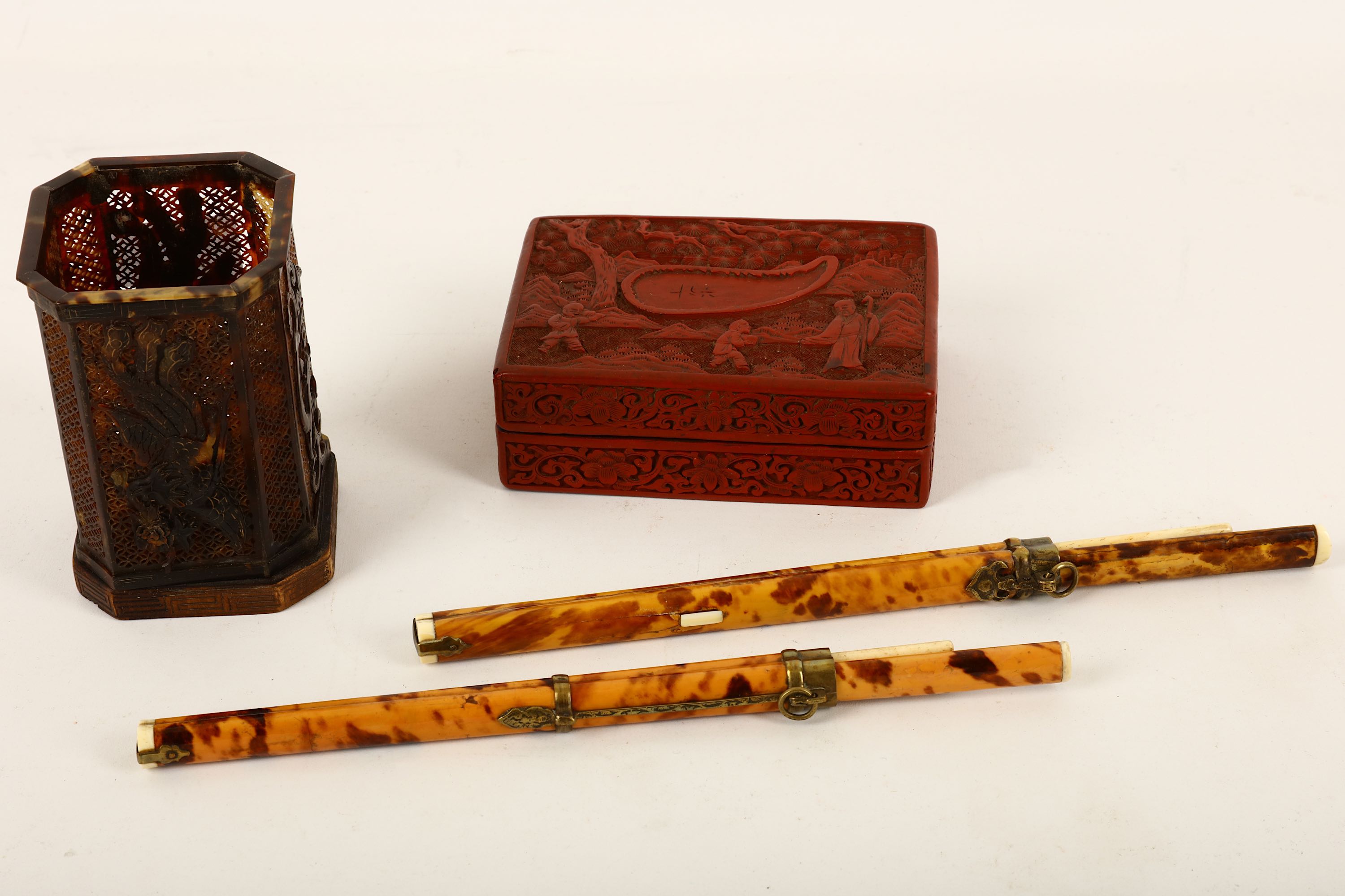 A group of Chinese items, including a carved and pierced tortoiseshell brush pot depicting phoenix