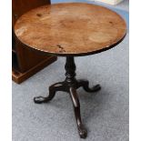 A Georgian mahogany tripod table, the circular tilt-top on a birdcage support and triform cabriole