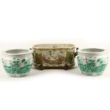 A pair of porcelain jardinières, 20th Century, green transfer-printed with Oriental landscape
