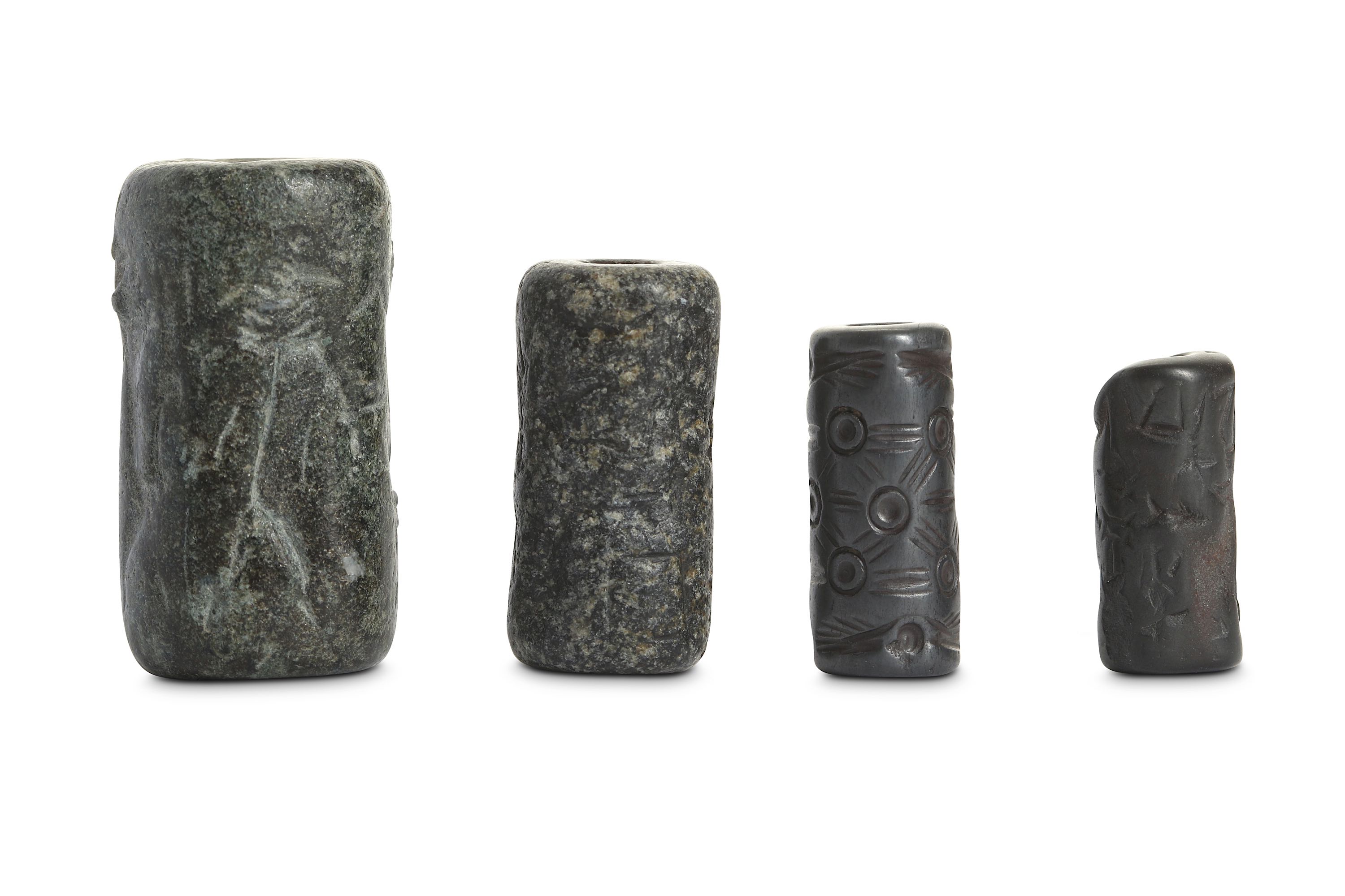 FOUR MESOPOTAMIAN CYLINDER SEALS Circa 3rd - 2nd M