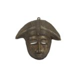 A BRONZE TRIBAL MASK Possibly a Baule mask from th