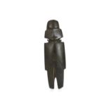 A MEZCALA STONE FIGURE Preclassic, 1400 - 500 B.C. With a smooth surface, the figure has an