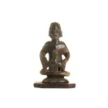 A LOMBA MOTHER AND CHILD FIGURE Carved in dark woo