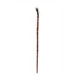 A SARAWAK STAFF, BORNEO A long wood staff composed of two pieces that insert into one another,