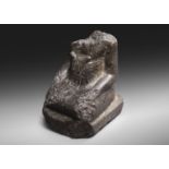 AN EGYPTIAN BASALT FIGURE OF KNEELING PRIEST Middl