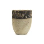 A NEAR EASTERN POTTERY BEAKER Circa 1st Millennium