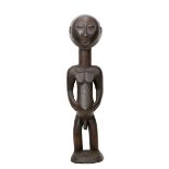 A HEMBA MALE ANCESTRAL FIGURE, DRC The stylised fi
