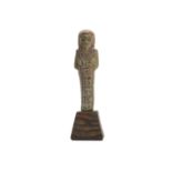 A GLAZED COMPOSITION SHABTI New Kingdom, 19th-20th