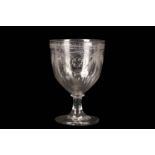 A LARGE ENGRAVED GLASS GOBLET