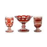 A BOHEMIAN RUBY STAINED GLASS TAZZA AND TWO BEAKERS