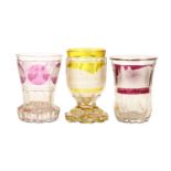 THREE BOHEMIAN ENGRAVED GLASS BEAKERS