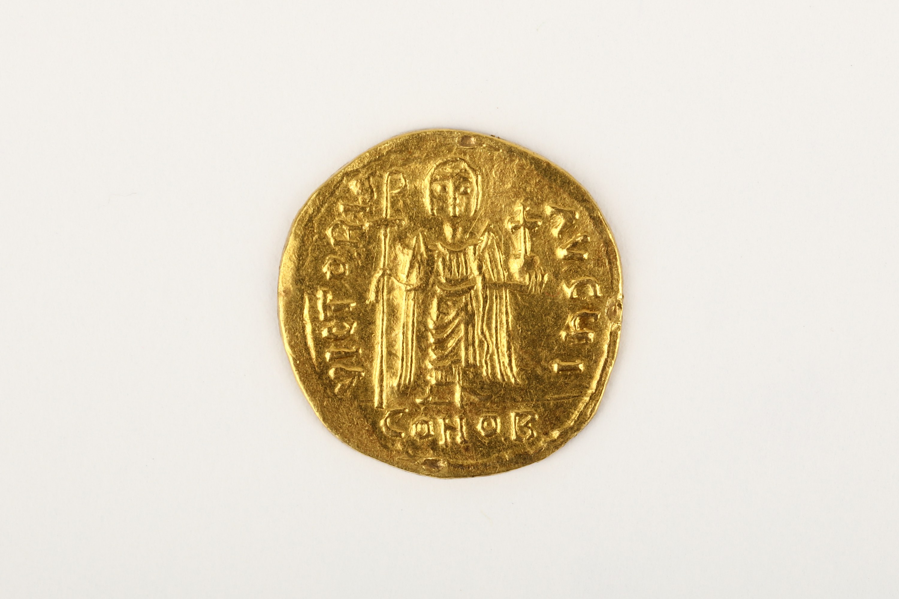 A Byzantine Gold Solidus of Phocas (602-610AD), Constantinople, obv. Phocas facing bust, bearded,