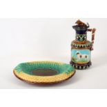 An English oval Majolica bread plate, 19th Century, with moulded basket and leaf decoration, 32cm