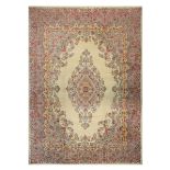 A fine Kirman carpet, South Persia, the light beige field with open floral medallion, the