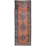 An antique Hamseh rug, Southwest Persia, the field with overall design of hooked and serrated