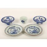 A collection of Chinese blue and white items, including two stem bowls painted with a lotus pond and