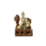 A Chinese soapstone carving of a Siddhartha, 19th Century, the emaciated figure seated with bare