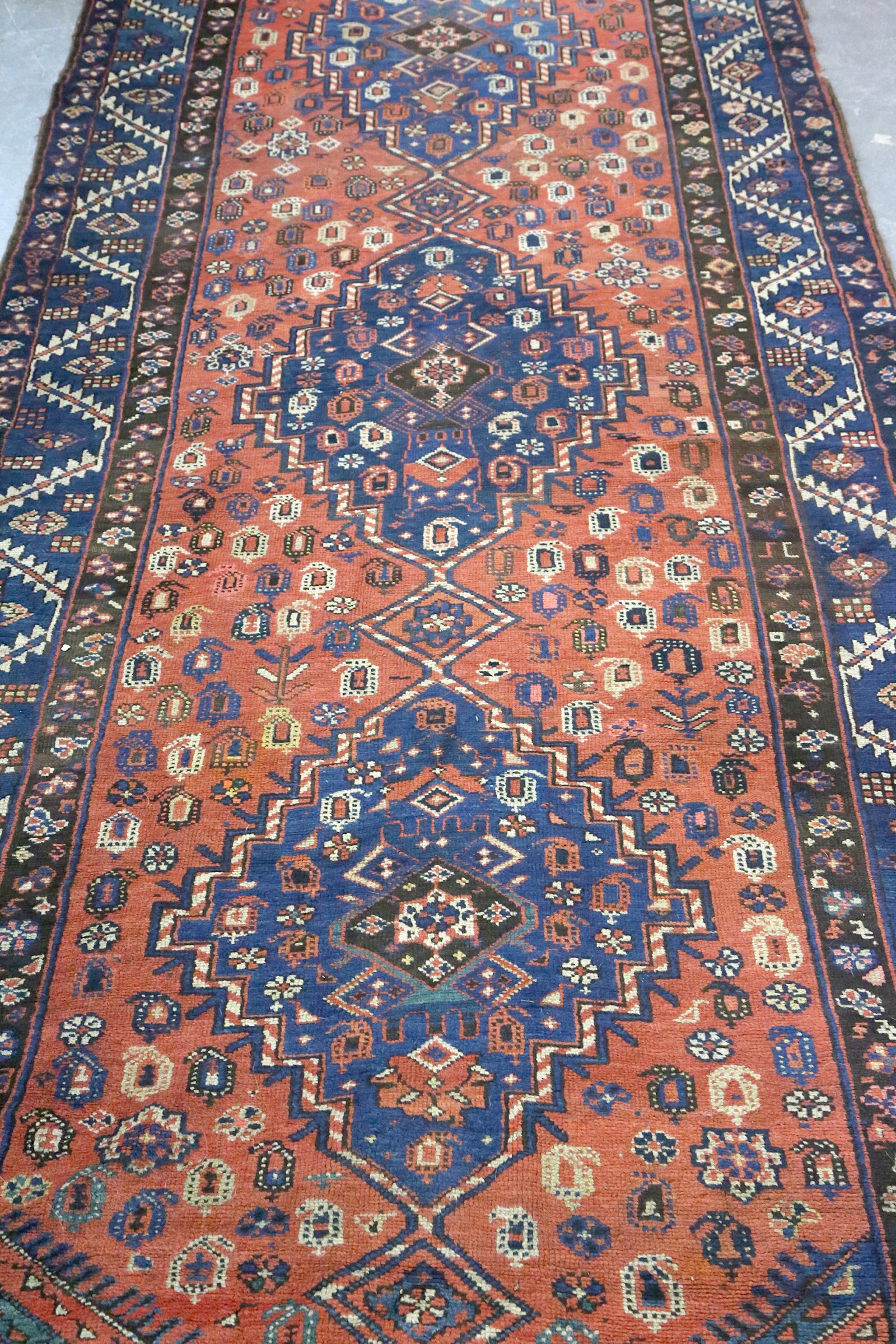 An antique Hamseh rug, Southwest Persia, the field with overall design of hooked and serrated - Image 4 of 6