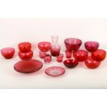 A collection of cranberry glassware, 19th / 20th Century, to include finger bowls, bowls, a