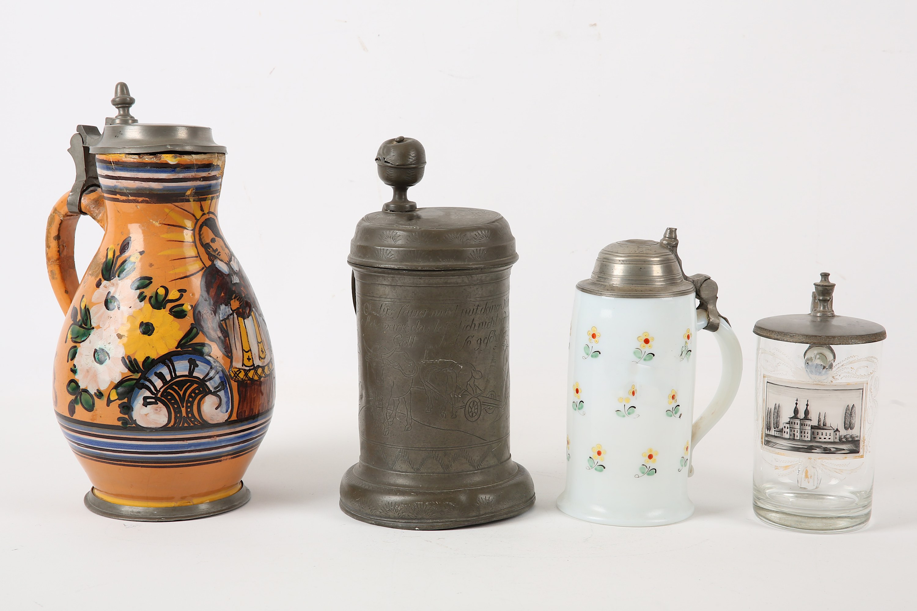 A French glazed earthenware and pewter mounted flagon, 19th Century, of baluster form, decorated