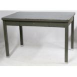 A 1950's Belgian enamelled steel desk by Travaux, with grey resin top and a single drawer, 78cm high