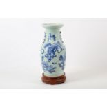 A Chinese blue and white celadon-ground vase, 19th Century, of twin handled baluster form, on a