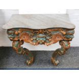 A continental carved and painted giltwood table, late 18th / early 19th Century, the legs and drop