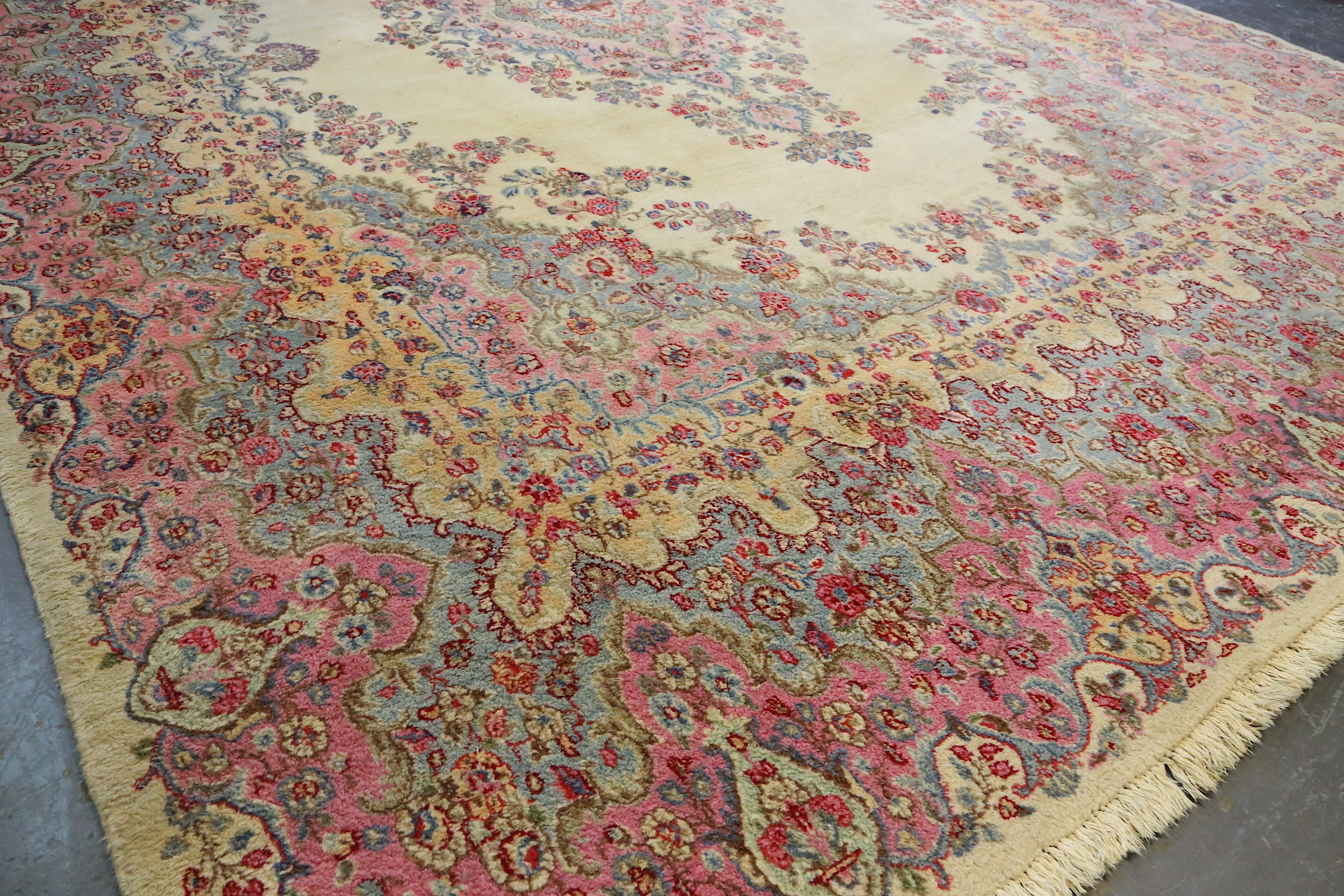 A fine Kirman carpet, South Persia, the light beige field with open floral medallion, the - Image 2 of 5