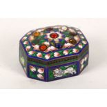 An octagonal enamelled box, North India, 20th Century, of octagonal form, the enamelled decoration