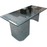A 'Corner' table, designed and manufactured by Fiam, Italy, with glass top and curved supports,