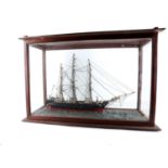 A model of a three-masted schooner, 19th Century, constructed in wood and fitted with bone masts and