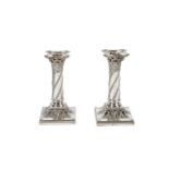 A pair of Victorian antique sterling silver desk / dwarf candlesticks, London 1892 by William Hutton