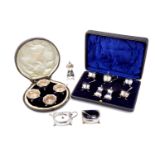 A mixed group of sterling silver cruets sets,