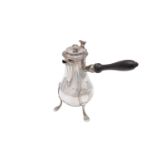 A late 18th century French Louis XVI silver bachelor’s coffee pot, Paris 1787, maker’s mark illegibl