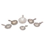 A mixed group of six late 19th/early 20th century Dutch silver tea strainers