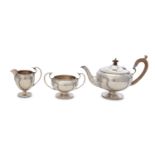 A George V antique sterling silver three-piece tea service, Birmingham 1918 by Mappin & Webb