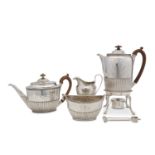 A cased Victorian antique sterling silver four-piece tea service, London 1877/78 by Dobson & Sons