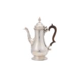 A George III antique sterling silver coffee pot, London 1764, makers mark obliterated possibly that