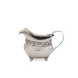 A George III antique sterling silver provincial milk or cream jug, York 1819 by James Barber & Willi