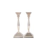 A pair of Elizabeth II sterling silver candlesticks, London 1963 by D J Silver Repairs