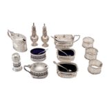 A mixed group of sterling silver cruets including a cased Edwardian set Birmingham 1904 by Snow and