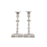 A pair of George II antique sterling silver candlesticks, London 1759 by John Cafe