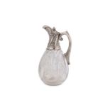 A Victorian silver-mounted cut glass claret jug, London 1897, by John Grinsell & Sons, also stamped